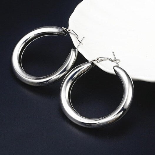 Shiny silver round hoop earring for women