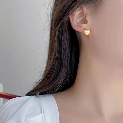 Mini heart gold stud earring