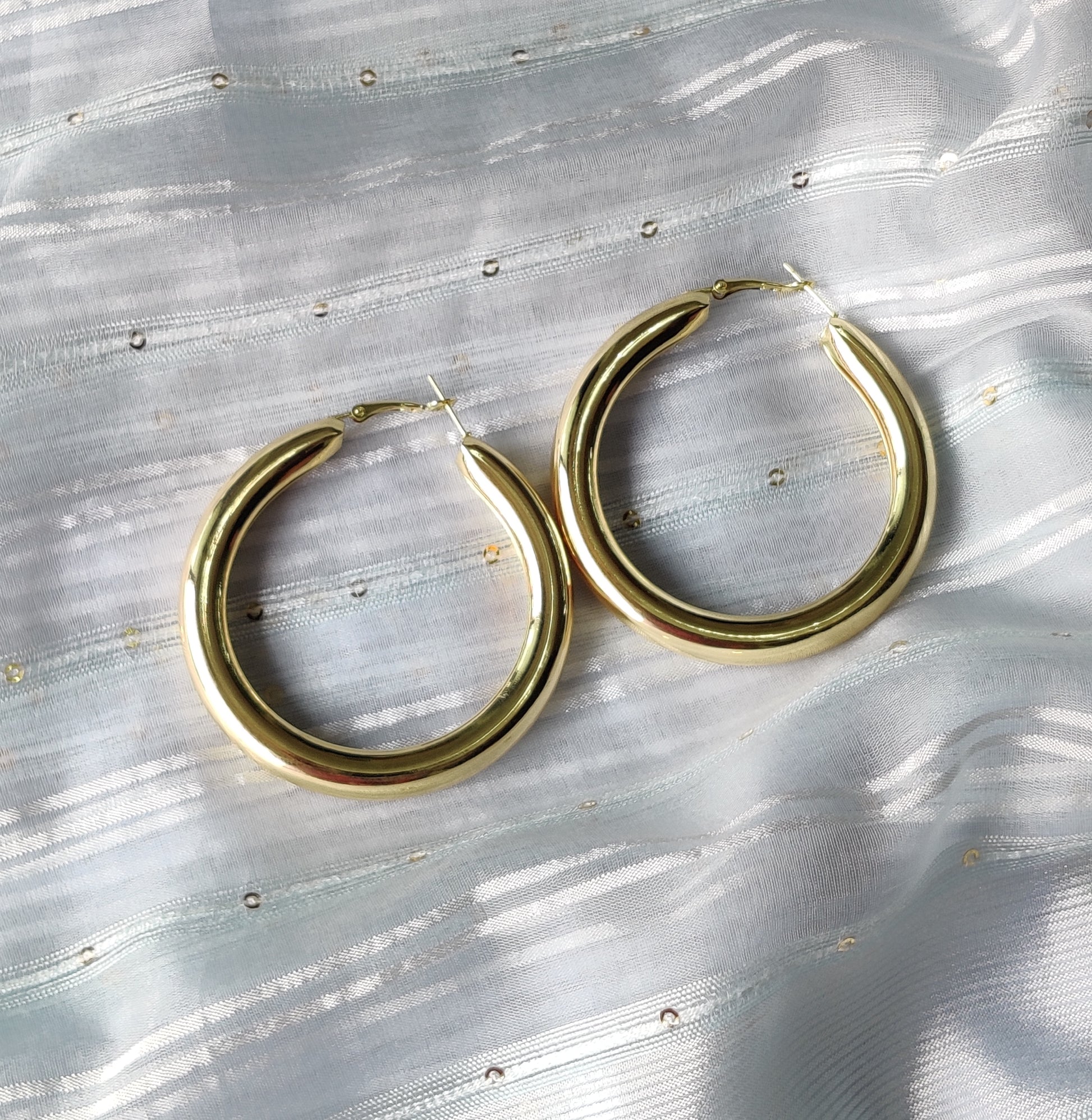 Shiny gold round hoop earring for women online