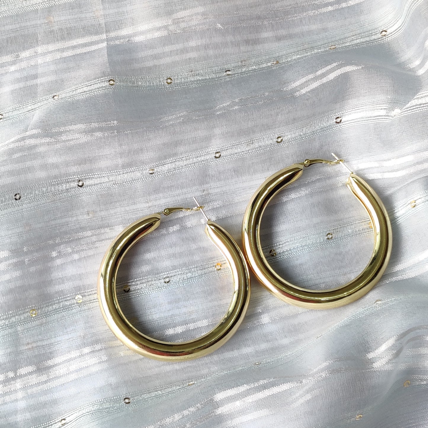 Shiny gold round hoop earring for women