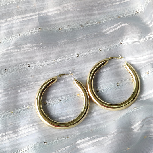 Shiny gold round hoop earring for women