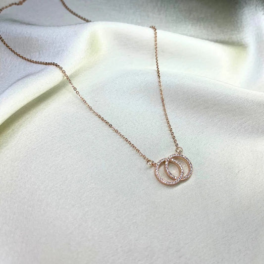 Double circle rose gold necklace with diamonds