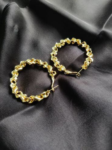 Spiral gold hoops earring