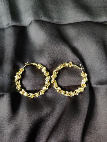 Spiral gold hoops earring