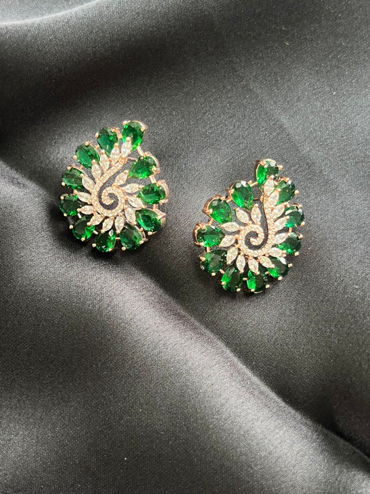 Green color flower shaped earring with emeralds