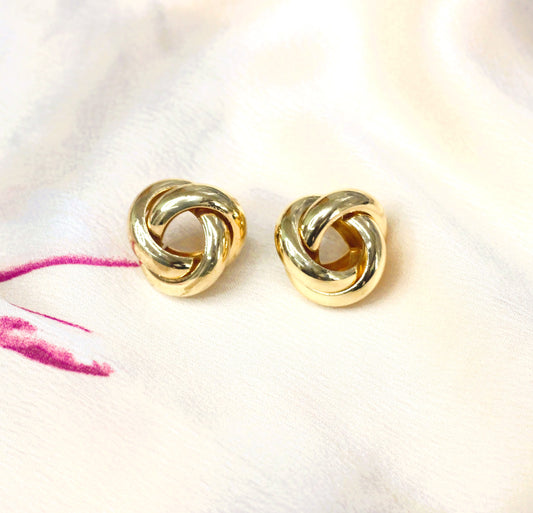 Gold twisted unique shape earring